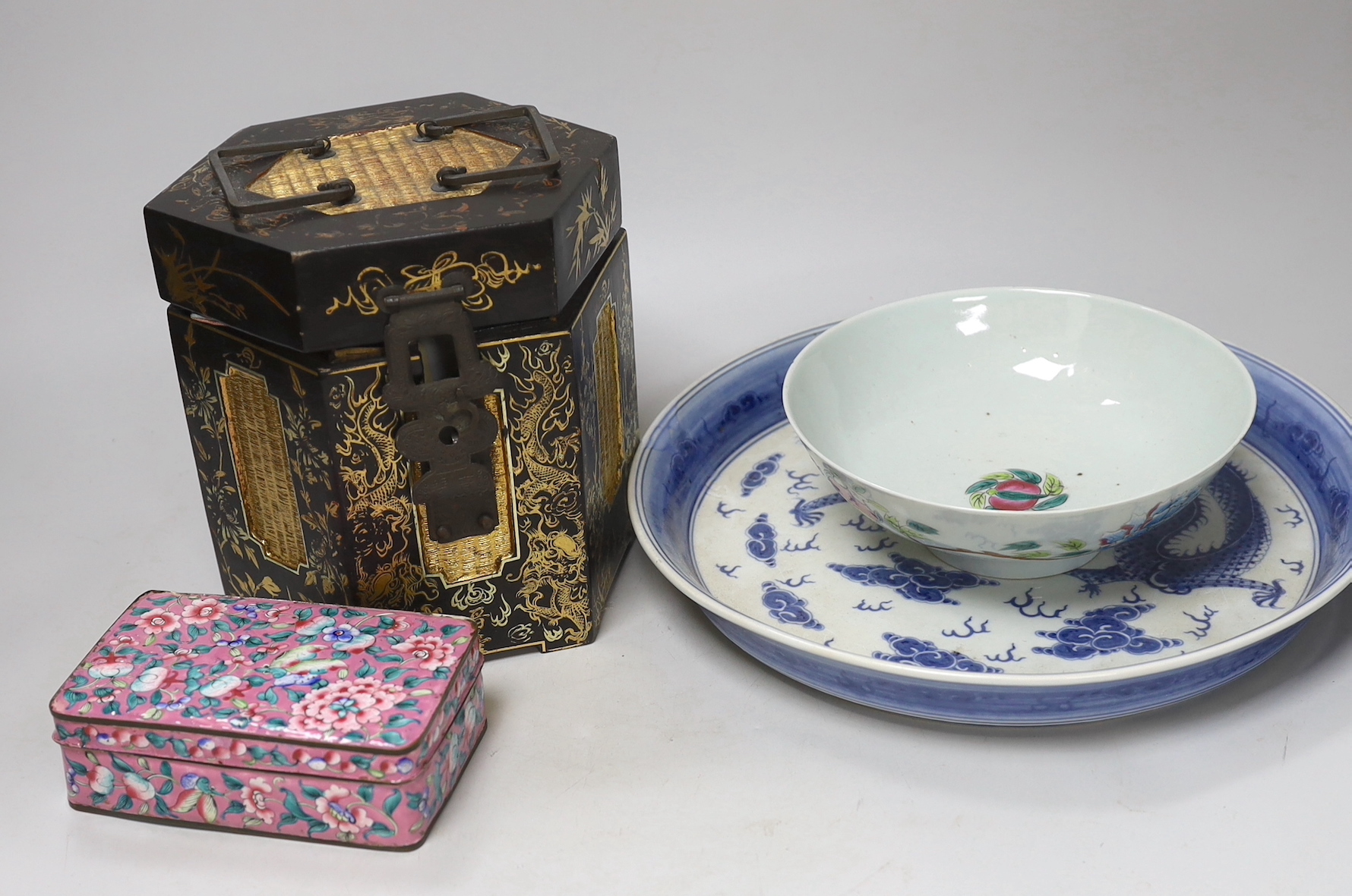 A Chinese blue and white dish, a famille rose bowl, a Canton enamel box and cover and a gilt decorated lacquer box and cover